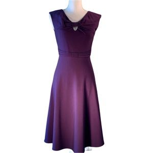 Calvin Klein dress with cut out & bow details